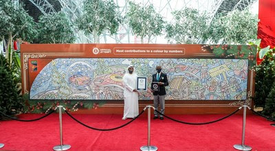 Alhasan Kaabous Alzaabi, Vice President of Operations at Farah Experiences receiving the Guinness World Records certificate at Ferrari World Abu Dhabi