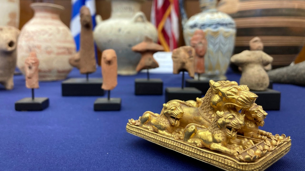 Stolen antiquities are displayed at a news conference at the offices of the Manhattan District Attorney Alvin Bragg in New York.