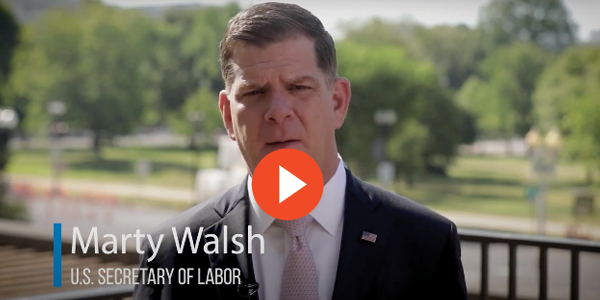 Screengrab of a video of Secretary Walsh speaking outside department headquarters in Washington, D.C.
