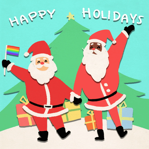 Santas waving with an LGBTQ+ flag
