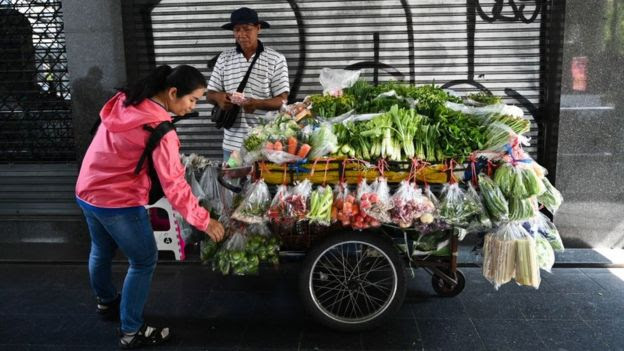 Imagem de vendedor de flores na Tailândia