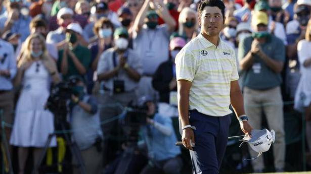  Japan's Hideki Matsuyama celebrates after winning The Masters, Augusta National Golf Club - Augusta, Georgia, U.S. - April 11, 2021 