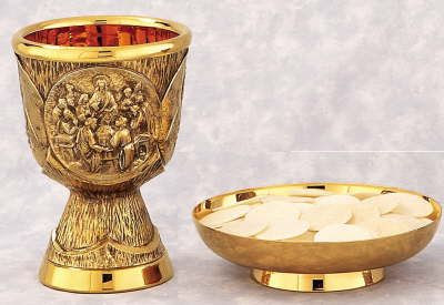 The paten and chalice are symbols of Holy Orders, as they are given to ...