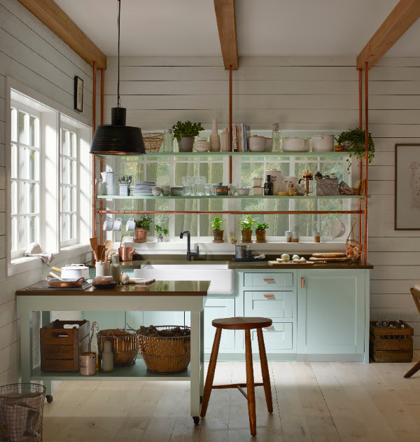 This kitchen feels like nature with natural wood grain and white. 