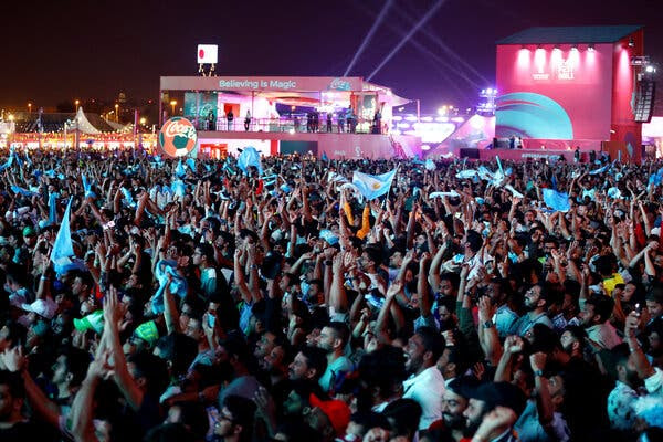 Argentina fans at Al Bidda Park in Doha celebrating after Messi’s goal.