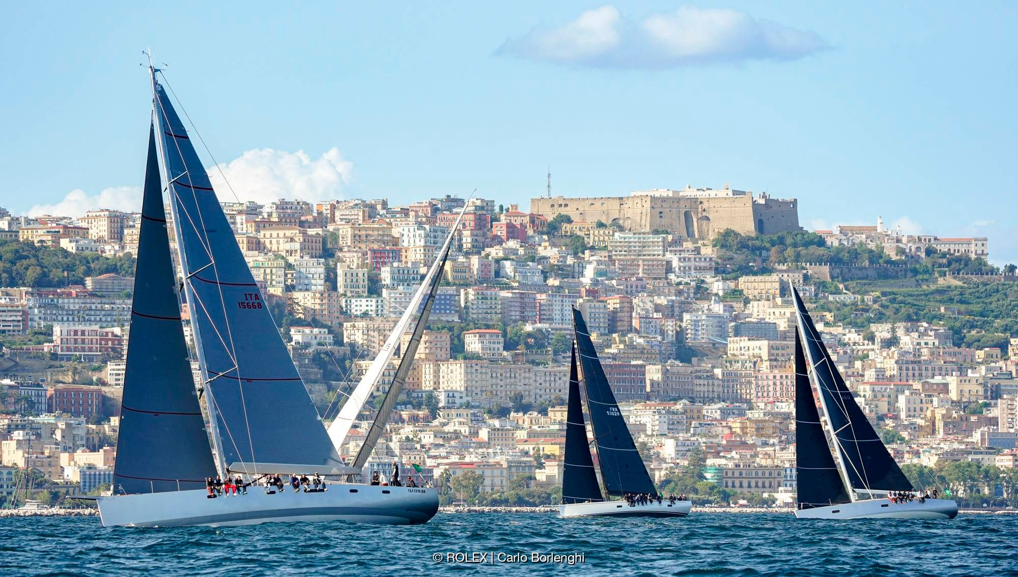 H20 (left) finished third overall ahead of Wallyño (right) while Jean-Pierre Dreau's Mylius 60 Lady First 3 (centre) was 8th overall in the full maxi fleet. Photo: ROLEX / Studio Borlenghi