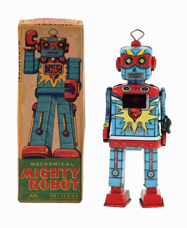 Ultra-rare Japanese tinplate wind-up Mighty Robot, sparking mechanism visible through plastic chest plate. Splashy blue, red and yellow graphics. Original color pictorial box. Estimate $50,000-$75,000