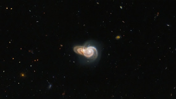 Hubble Space Telescope captures two 'overlapping' spiral galaxies in new photo Overlap_w570