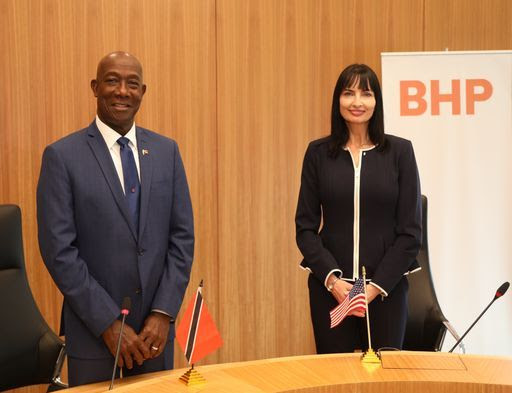 Prime Minister Dr Keith Rowley and BHP President Operations Petroleum Geraldine Slattery pose for a photo at the energy company’s petroleum headquarters in Houston, Texas in June. The PM visited the company to hold talks on various energy-related matters.