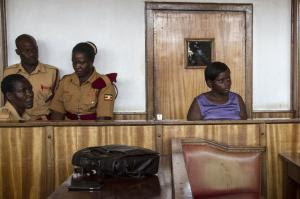 Ugandan nanny Jolly Tumuhiirwe, 22, attends a …