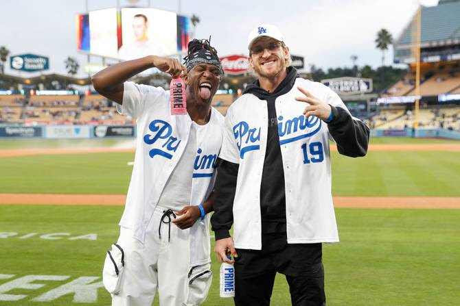 Logan Paul and KSI pose with Prime hydration bottles prior to a regular season game between the Arizona Diamondbacks and Los Angeles Dodgers on March 31, 2023, at Dodger Stadium in Los Angeles, CA.