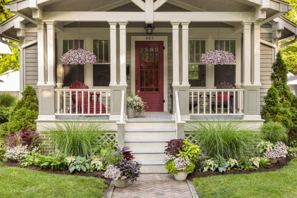 Front porch with hanging baskets