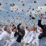 1280px-US_Navy_110527-N-OA833-014_Newly_commissioned_Navy_and_Marine_Corps_officers_toss_their_hats_during_the_U.S._Naval_Academ