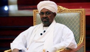 Sudan: Ousted jihadist war criminal al-Bashir appeared at rally with Qur’an in one hand and AK-47 in the other