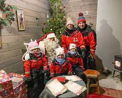 family meeting Santa Claus in Lapland