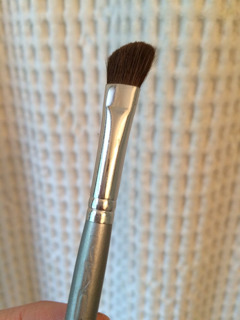 use a soft angled brush to contour nose
