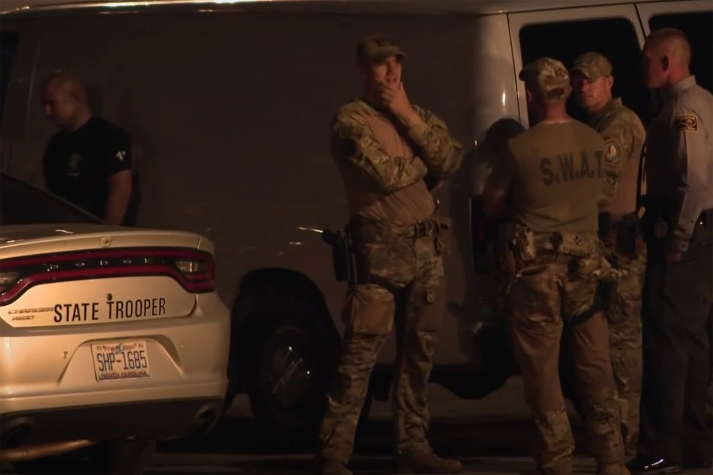Deputy killed, another wounded in an hours-long standoff with gunman in North Carolina