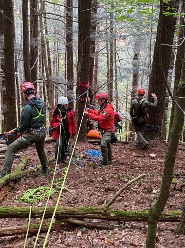 Rangers in woods during rope training