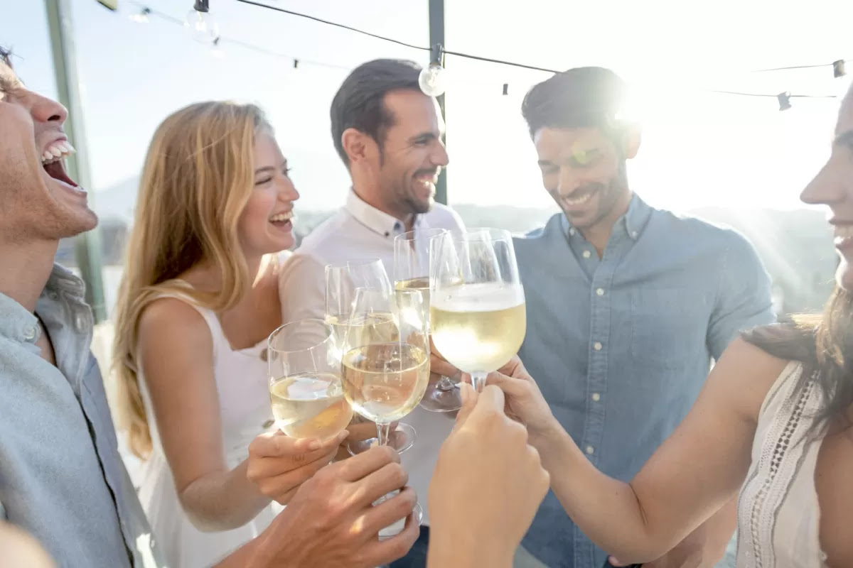 306243-1200x800-toasting-and-celebrating-with-white