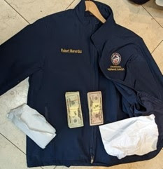 Picture of jacket bearing Menendez’s name with money on top of it