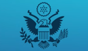 Department of State Seal with light blue background. 