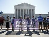 Anti-abortion protesters wait outside the Supreme Court for a decision, Monday, June 29, 2020 in Washington on the Louisiana case, Russo v. June Medical Services LLC. (AP Photo/Patrick Semansky)