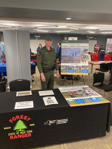 Rangers stands at informational table during career fair