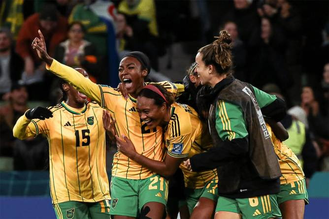Jamaica’s women’s team celebrating at the end of a game