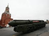 FILE - In this Tuesday, May 9, 2017 file photo, Russian Topol M intercontinental ballistic missile launcher rolls along Red Square during the Victory Day military parade to celebrate 72 years since the end of WWII and the defeat of Nazi Germany, in Moscow, Russia. Russia says it has met the nuclear arsenal limits of a key arms control treaty but has some issues with U.S. compliance. Monday, Feb. 5, 2018 was the deadline to verify compliance by both the United States and Russia with the New START treaty signed in 2010. (AP Photo/Alexander Zemlianichenko, File)