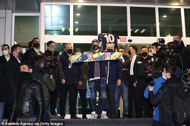 Mesut Ozil arrives in Turkey with his family ahead of his unveiling at Fenerbahce as his seven-and-a-half-year spell at Arsenal finally ends (photos)