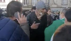 France: A Muslim spits at a priest as the priest is blessing a town square