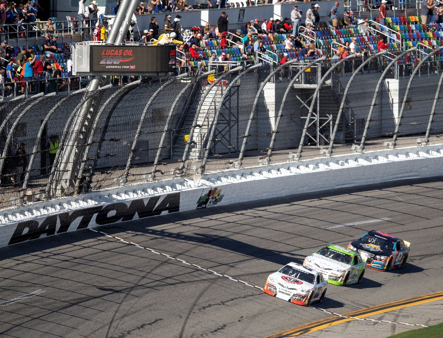 A race car on a track
Description automatically generated with low confidence
