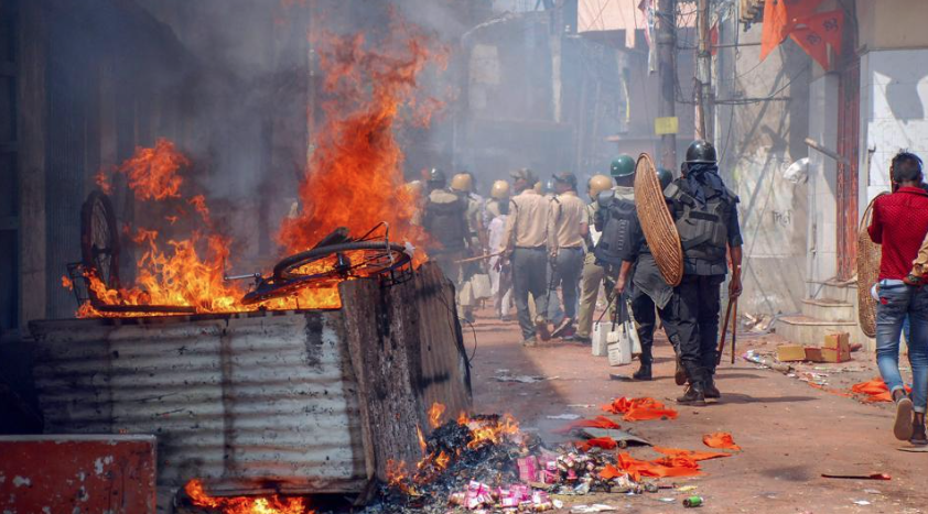 Police patrol the streets of Raniganj, Asansol, after a Ram Navami procession turned violent. (Credit: PTI)
