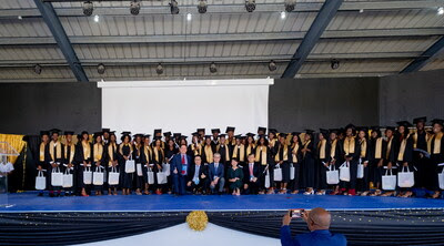 Global Sae-A’s S&H School in Haiti produced its first graduates in 10 years since its establishment. The photo shows Chairman WK Kim (center, front row), the school’s founder, taking a commemorative photo along with other key attendees and graduates after awarding diplomas. (From the left in the front row, Global Sae-A Sr. Advisor Lon Garwood, S&H Global Vice President David Moon, Global Sae-A Chairman WK Kim, S&H School Principal Sophia Choi, and Global Sae-A CEO KM Kim)