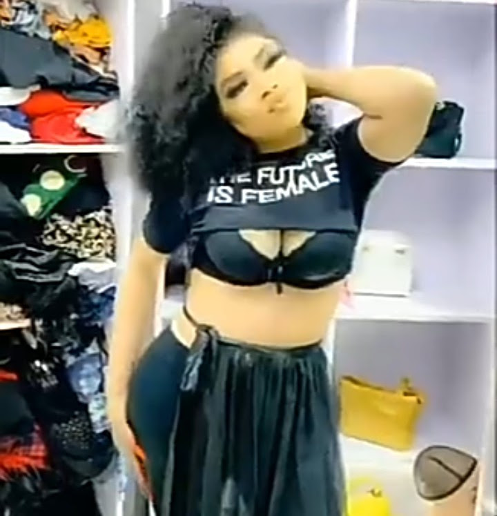 Bobrisky shows off his "boobs" while rocking a crop top with the words "The Future Is Female" (video)