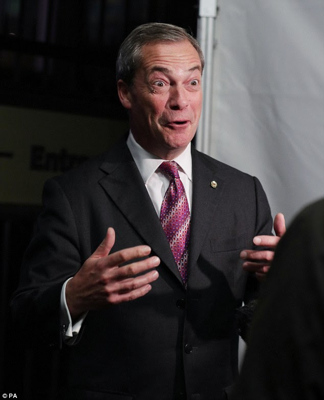 Nigel Farage speaks to the media outside the US presidential election night party at the US Embassy in London earlier this morning