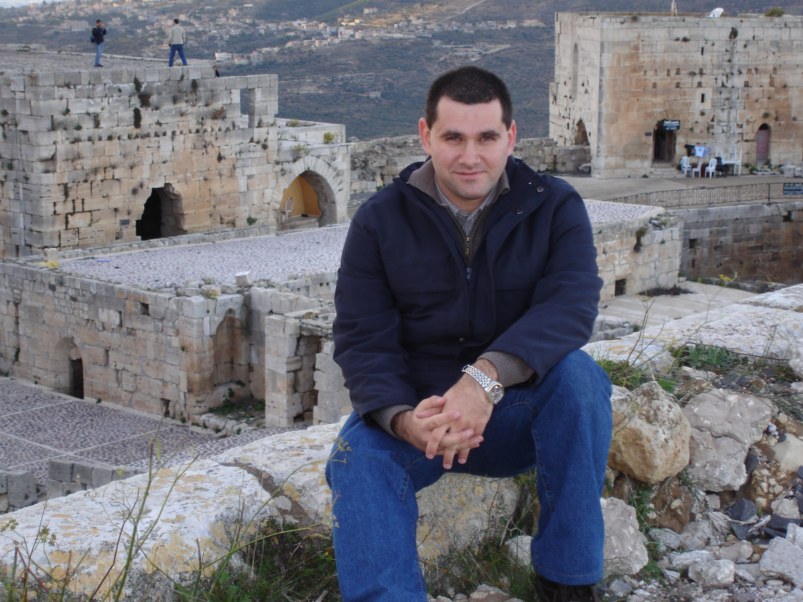 Aboud Dandachi at the 12th Century Krak des Chevaliers in Homs. In 2013, the Syrian government bombed this site, destroying what had been the world's best preserved Crusader Castle. Photo courtesy