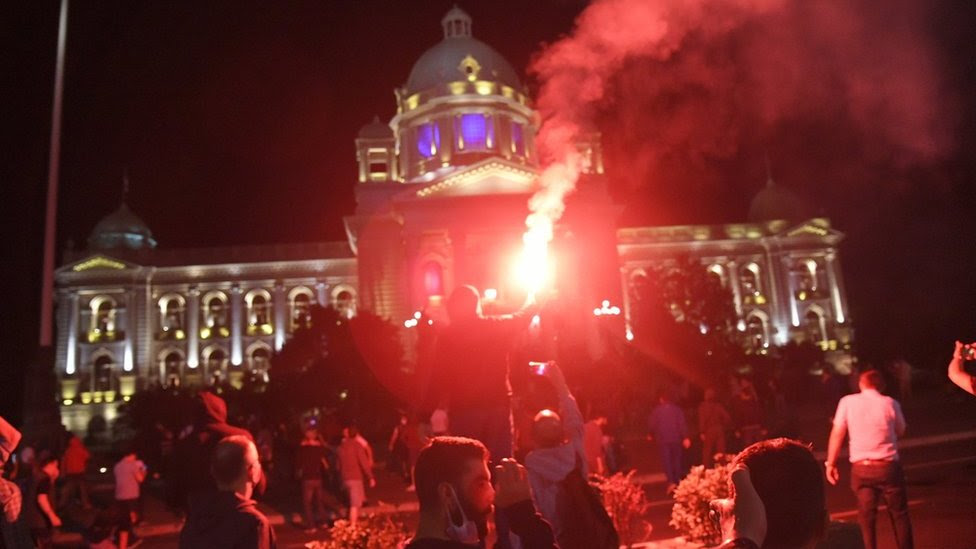 Coronavirus: Belgrade protesters storm Serb parliament over curfew