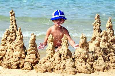 An
                      Israeli boy makes sandcastles on the Mediterranean
                      Sea.