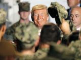 In this Tuesday, May 28, 2019, file photo, U.S. President Donald Trump greets to U.S. servicemen at U.S. Navy multipurpose amphibious assault ship USS Wasp at the U.S. Navy&#39;s Yokosuka base in Yokosuka, south of Tokyo. (AP Photo/Eugene Hoshiko, File)