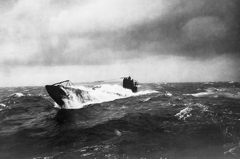 German U-boat rises breaks through the ocean surface.