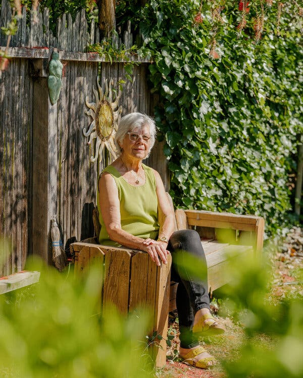 Susan Kirsch in her backyard, just a few hundred feet from the site where Phil Richardson hopes to build a multi-unit housing development.