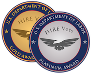 Two circles that resemble medallions or coins. One is blue and gold and the other is blue and silver. There is a slight red outline. Each of the circles say U.S. Department of Labor and Hire Vets, and have a silhouette of an eagle on them. The one that is blue and gold says Gold Award and the one that is silver and blue says Platinum Award.