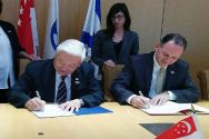 Ambassadors Winston Choo Wee Leong and Gil Haskel at the signing ceremony of the MOU.