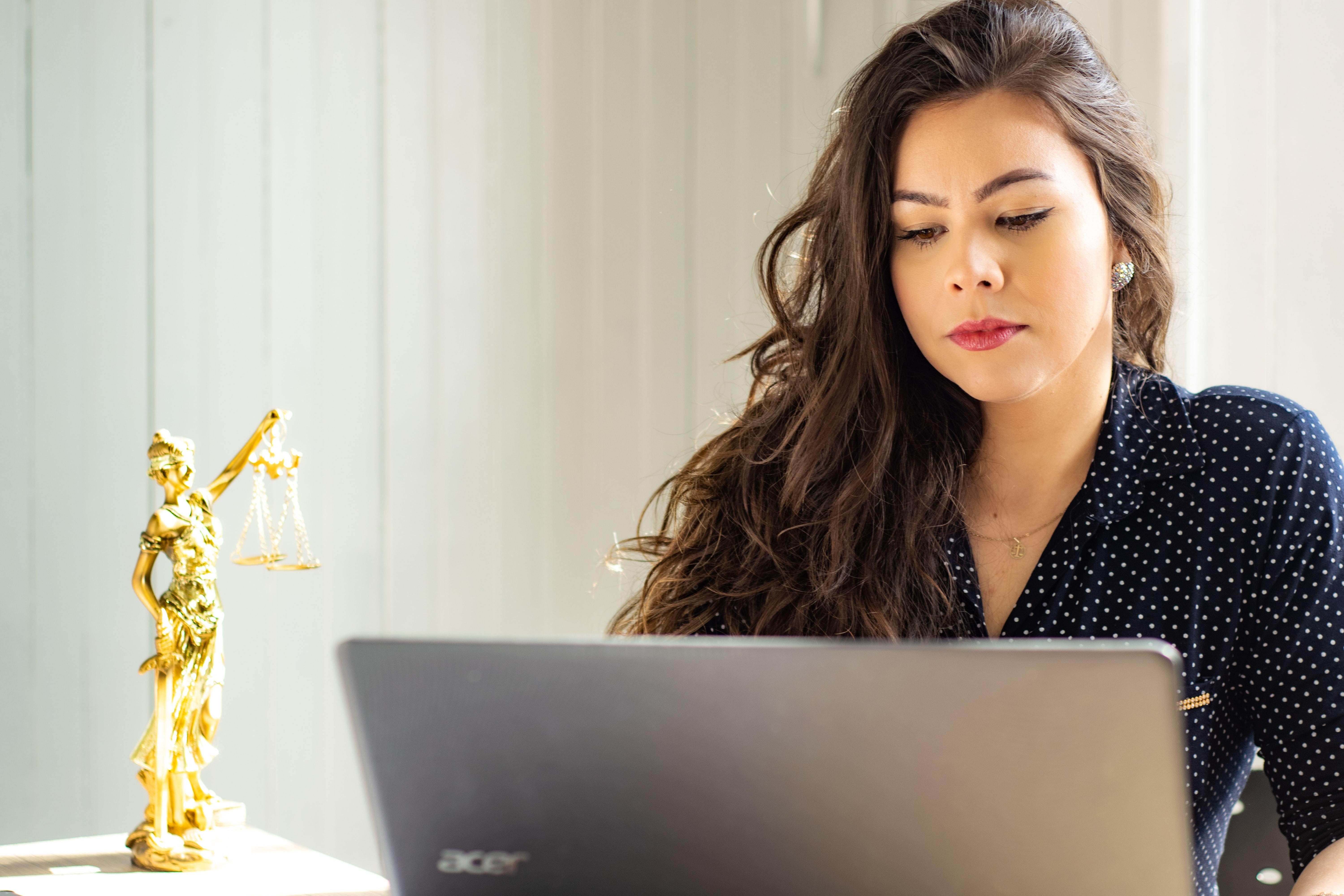 Lawyer researching for her case for mediation