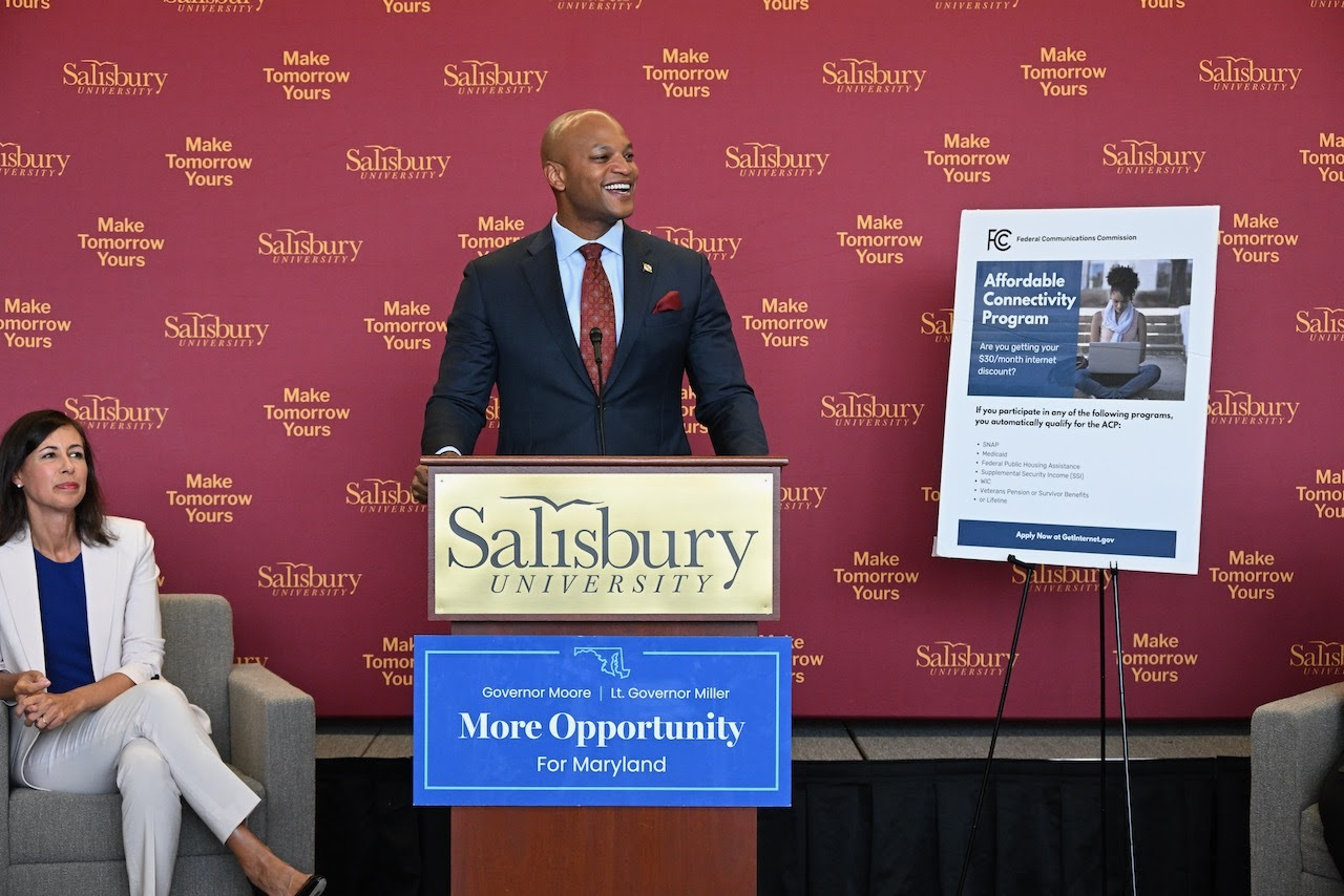 Governor Wes Moore standing at podium