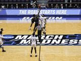 In this March 19, 2019, photo, Fairleigh Dickinson&#39;s Kaleb Bishop (12) and Prairie View A&amp;M&#39;s Iwin Ellis (13) leap for the opening tip-off in the first half of a First Four game of the NCAA college basketball tournament in Dayton, Ohio. (AP Photo/John Minchillo) **FILE**