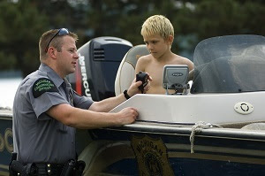 Michigan DNR conservation officers spend a lot of time talking with people of all ages about the importance of safe outdoor recreation.