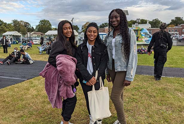 Three Kean students pose for a photo at the Jazz Roots Festival. 