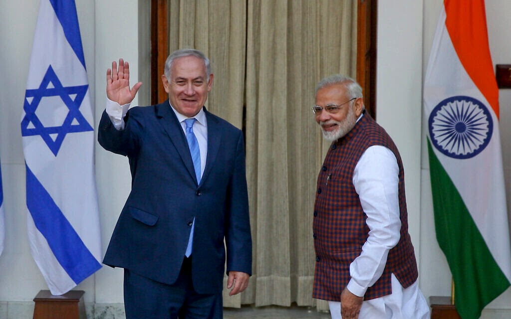 File: India's Prime Minister Narendra Modi, right, gestures and Israeli Prime Minister Benjamin Netanyahu waves to the media as they arrive for a meeting in New Delhi, India, Jan.15, 2018. (AP Photo, File)